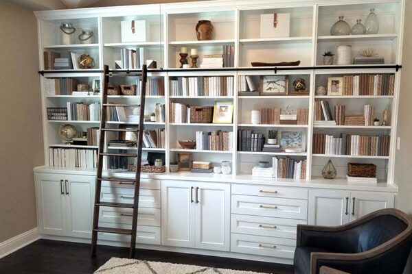 Custom built-in bookcases with library laddar in Texas