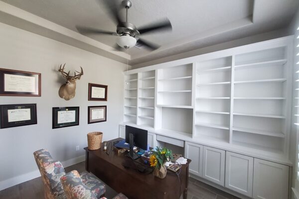 full wall custom bookshelves and cabinets built-in