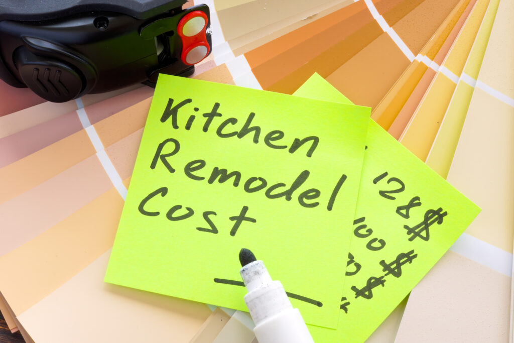 post-it note with Kitchen Remodel Cost written on it