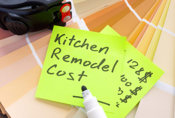 post-it note with Kitchen Remodel Cost written on it